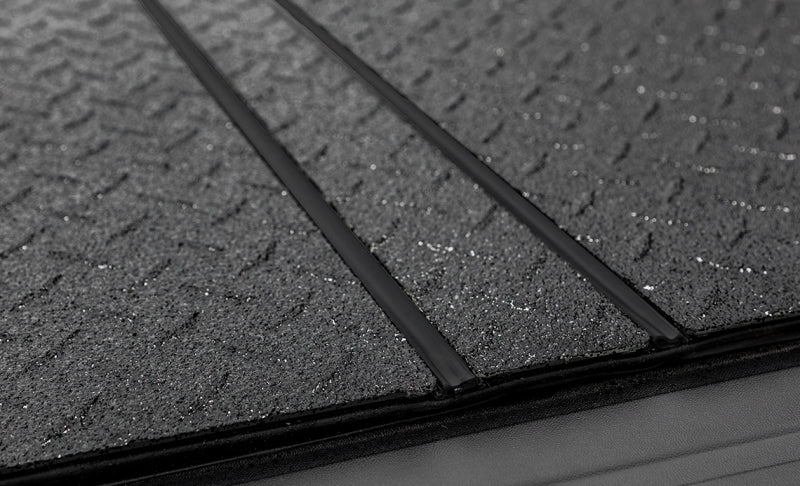 Access LOMAX Tri-Fold Cover 07-21 Toyota Tundra - 5ft 6in Bed (w/ Deck Rail) - Black Diamond