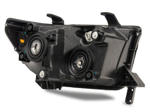 Raxiom 07-13 Toyota Tundra Axial Series Headlights w/ LED Bar- Black Housing (Clear Lens)