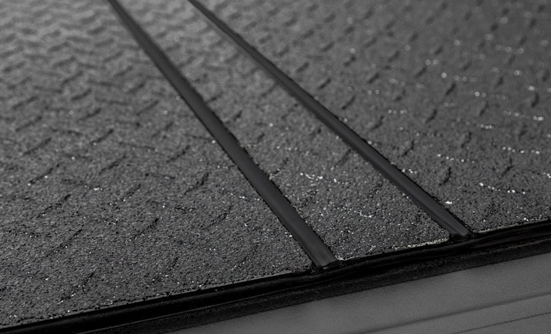 Access LOMAX Tri-Fold Cover 07-21 Toyota Tundra - 5ft 6in Bed (w/ Deck Rail) - Black Diamond