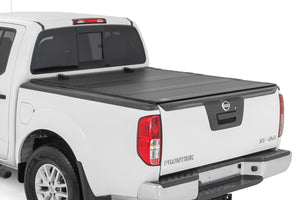 Rough Country Hard Tri-Fold Flip Up Bed Cover 5' Bed | Nissan Frontier 2WD/4WD (05-21)
