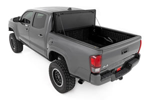 Rough Country Hard Tri-Fold Flip Up Bed Cover | Toyota Tacoma (05-15)
