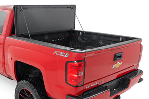 Rough Country Hard Tri-Fold Flip Up Bed Cover | Chevy/GMC 1500/2500HD/3500HD (14-19)