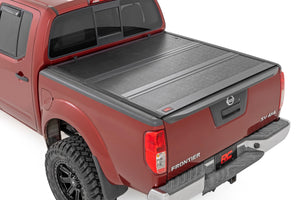 Rough Country Hard Low Profile Bed Cover 5' Bed | Cargo Mgmt | Nissan Frontier (05-21)