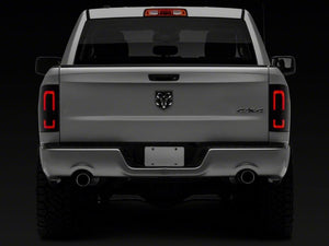 Raxiom 09-18 Dodge RAM 1500/2500/3500 Axial Series LED Tail Lights- Black Housing (Smoked Lens)