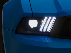 Raxiom 10-12 Ford Mustang LED Projector Headlights SEQL Turn Signals- Black Housing (Clear Lens)