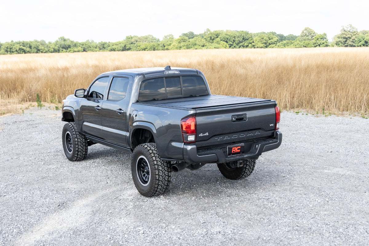 Rough Country Hard Tri-Fold Flip Up Bed Cover | Toyota Tacoma 2WD/4WD (16-23)