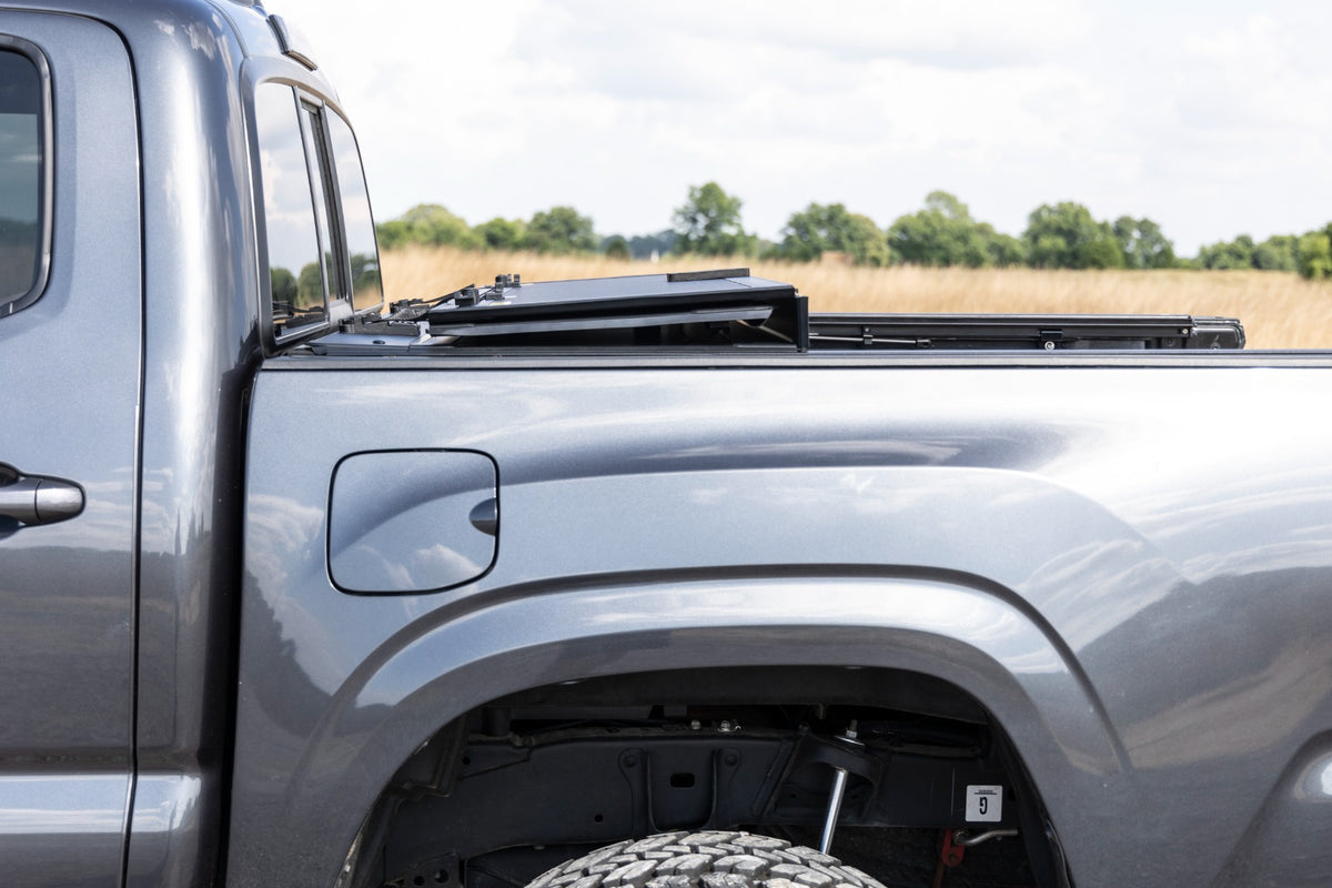 Rough Country Hard Tri-Fold Flip Up Bed Cover | Toyota Tacoma (05-15)