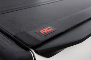 Rough Country Hard Tri-Fold Flip Up Bed Cover 5' Bed | Nissan Frontier 2WD/4WD (05-21)