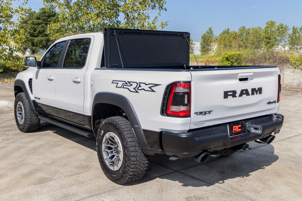 Rough Country Hard Tri-Fold Flip Up Bed Cover | Ram 1500 (19-26)/1500 TRX (21-24)