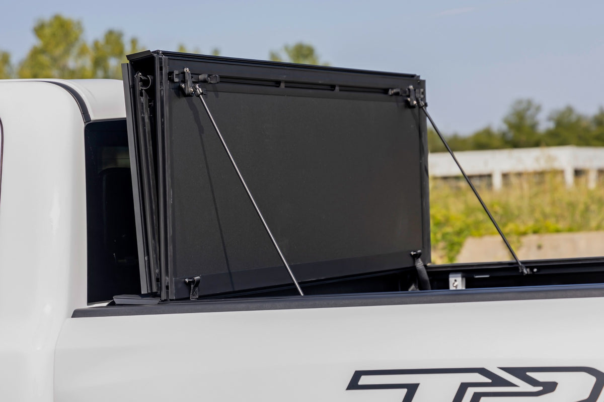 Rough Country Hard Tri-Fold Flip Up Bed Cover | Ram 1500 (19-26)/1500 TRX (21-24)