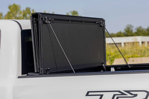 Rough Country Hard Tri-Fold Flip Up Bed Cover | Ram 1500 (19-26)/1500 TRX (21-24)