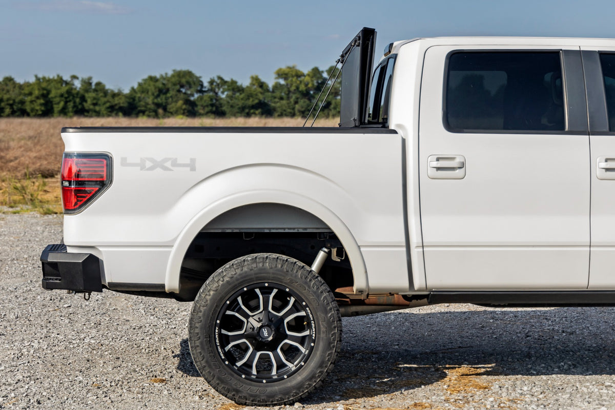 Rough Country Hard Tri-Fold Flip Up Bed Cover | Ford F-150 2WD/4WD (04-14)
